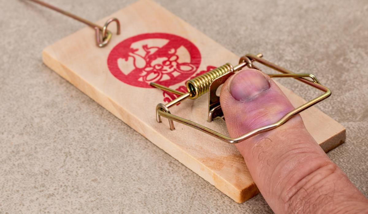Finger caught in a mouse trap